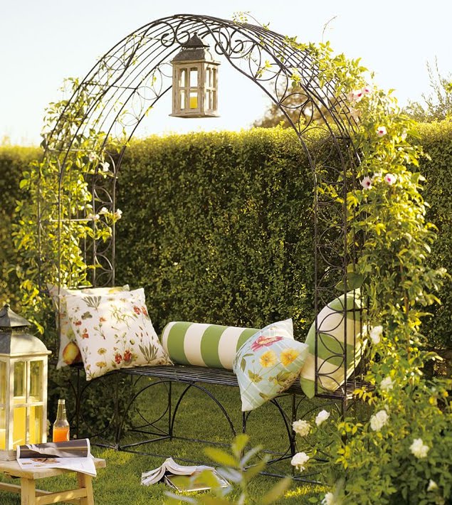 This beautiful Garden Trellis Bench by PotteryBarn has our hearts all 