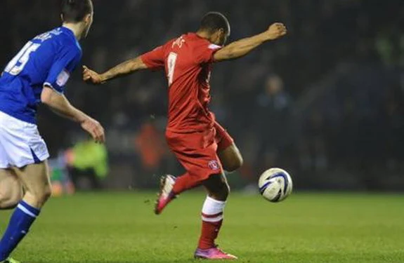 Charlton player Danny Haynes shoots to score against Leicester