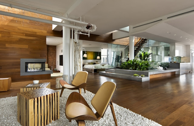 Photo of amazing interiors in the penthouse, fresh design and wooden furniture