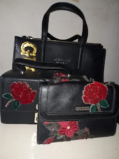 " A small collection of Guess bags"