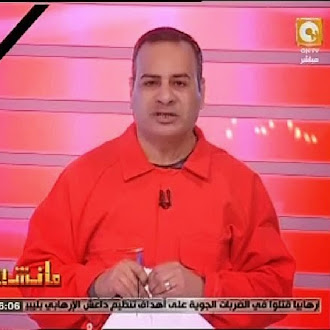 القرموطى يرتدى بدلة إعدام بـ"مانشيت" للتعليق عن إعدام المصريين فى ليبيا 