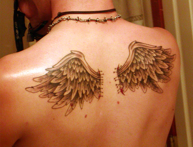 full back tattoo wings. Tattoo Wings - An Alluring and