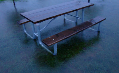 Picnic Table in Large Puddle