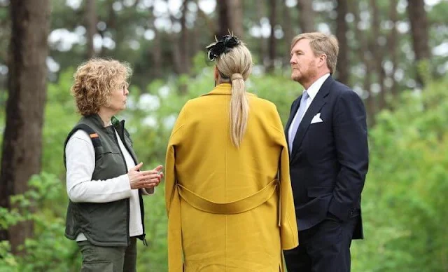 Queen Maxima wore a yellow double-breasted blazer by Zara, and yellow wide leg pants by Zara. Natan yellow wool coat