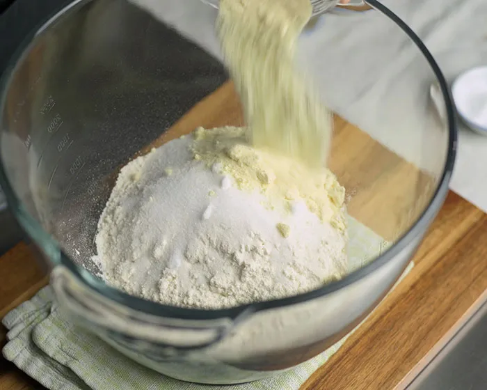 Add milk powder to the flour