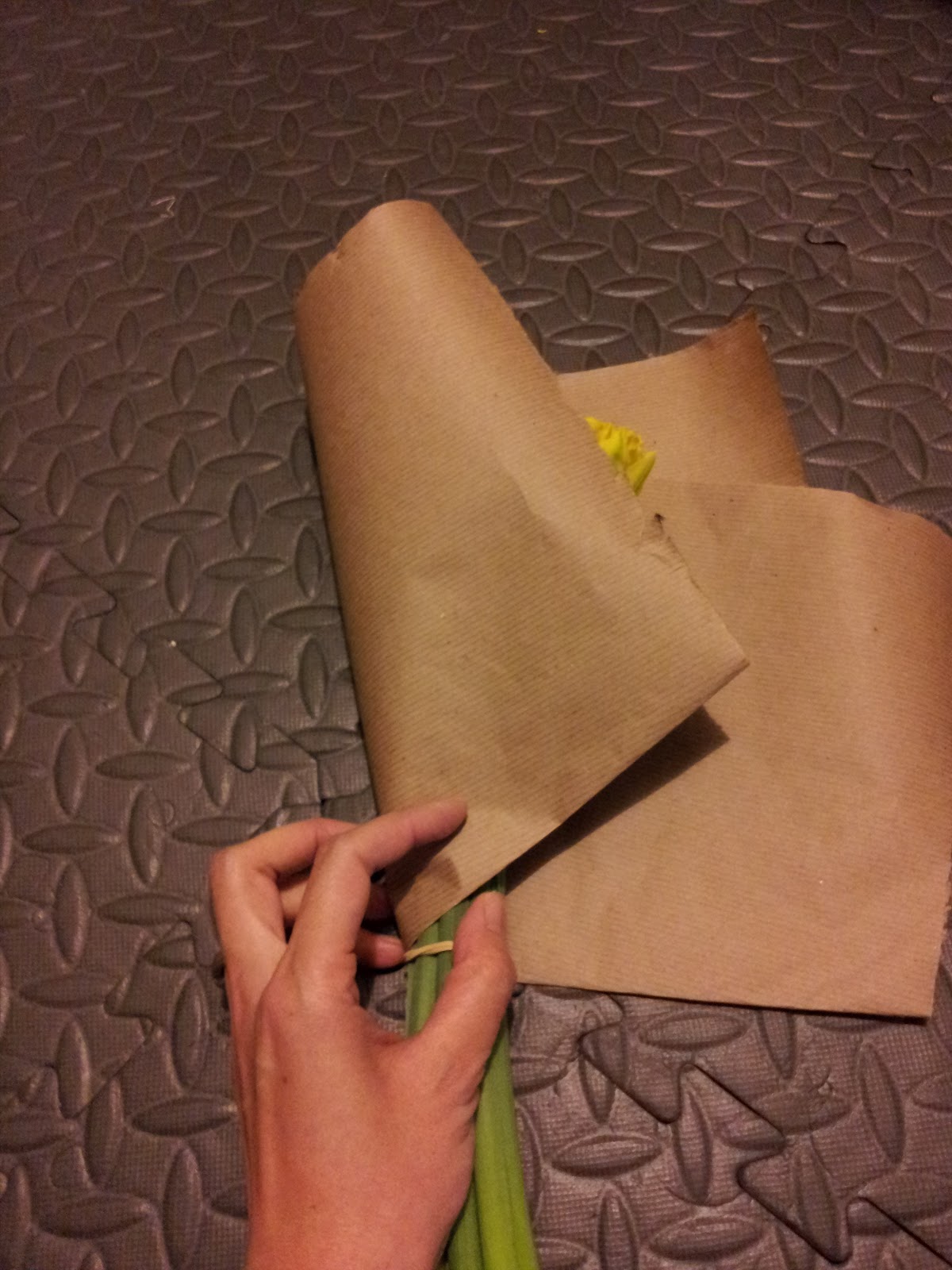 step 3 lay flowers on center of paper above rubber