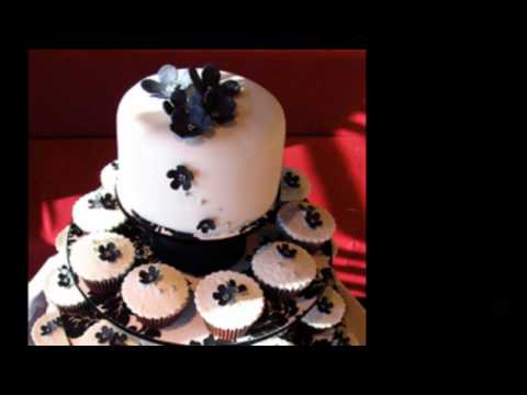 The beautiful black and white themed wedding cupcake idea is custom made and