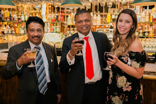 Happy Guests Sharing Toasts With The Couple