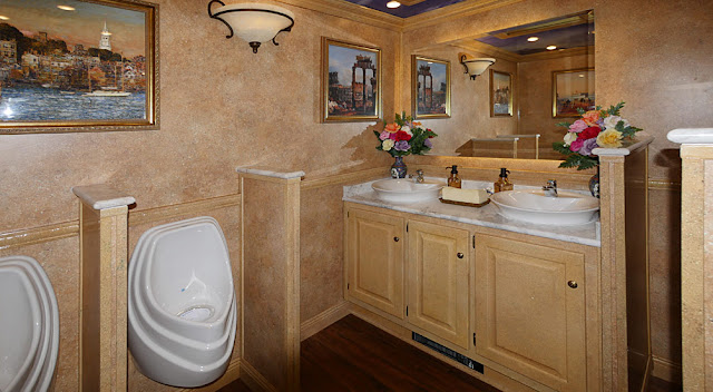 The Versailles luxury restroom trailer has a total of 11 bathroom stations