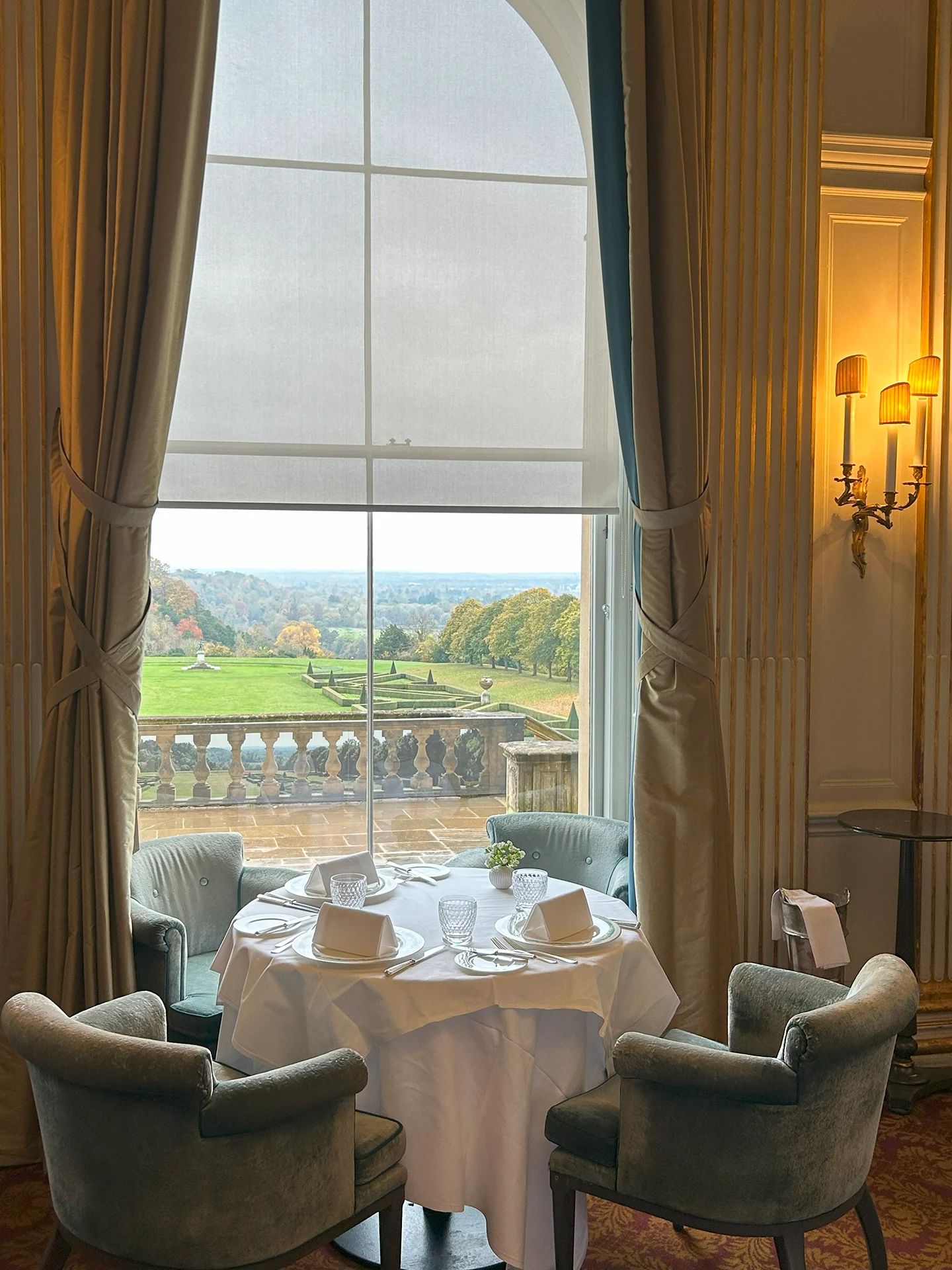 Garden views from lunch at the Cliveden House restaurant, luxury UK travel