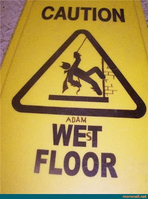 adam west floor sign wet floor