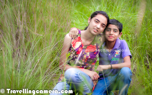 Photographying Kids and Families is again a new challenge and interesting area to explore. Recently I have been meeting some interesting people who want me to click some of their Family Portraits. although none of those photographs can be posted on PHOTO JOURNEY. This time, Ankita, Priyanka and their naughty brother allowed us to post some of the casual shots here...Monsoons really help is getting appropriate photographs for various reasons. You get better contrast due to greenery everywhere and light during monsoons is comparatively better during evenings.Every photographer has his own philosophy about Family Portraits and that's what defines their photographic style. But there are some standard things everyone of them follows and Digital Photography School explains them in terms of Dos & Don'ts - http://digital-photography-school.com/family-portraits-dos-and-dontsWith most of these shoots, kids are usually uncomfortable in the beginning and slowly they needs to be motivated throughout the sessions to get better shots towards the end... In many of these photographs you will notice that kids are not very comfortable. Situation is easy to handle when there are multiple kids playing around and interacting with each other. At times, Photographer need not to put efforts in making them comfortable with the ideas of shooting various framesTarun was a great help me for this shoot - Always smiling cheerful and champion at cracking jokes... He was always ready for doing anything to make their sisters laugh, pose or jump at times :)During the shoot, showing good photographs on Camera-LCD is a big motivating factor for family members to get into more comfortable state and then they start giving their own ideas, which are more useful at times. When they start thinking about frames, at times better ideas come up because they better know their space and what suites better to their personality. I am not rigid on client's ideas. In my opinion, it's always better to listen to them, do what they want and also try my own ideas. End of the day, all of us want good results.Jump shot is one of my favorite for Kids Photography. Above photograph is funny. Here Tarun is just acting like jumping but he never jumped on my call. His acts made the whole environment cheerful and we got some of the best Flying shots. We shall try to share some of the better ones soon on Photo Journey.It was good to spend a monsoon evening with these three kids and had fun !!!