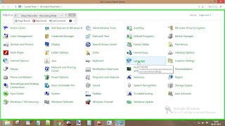 User left click on "Language (link)" in "All Control Panel Items".