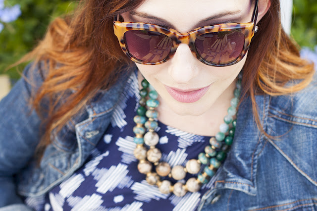 Amy West in Anthropologie Sunglasses, jean jacket, necklace, and swing dress
