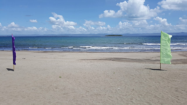 beach in front of Patio Victoria and Baluarte Beach Resort with a view of Dio Island in White Beach, San Jose, Tacloban