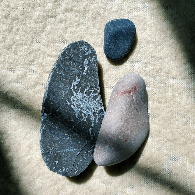 Three pebbles.