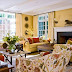 Living Room Design with Butter Yellow-Colored with Gold Tones