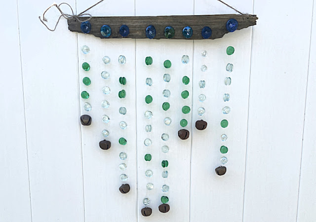 wind chime on fence