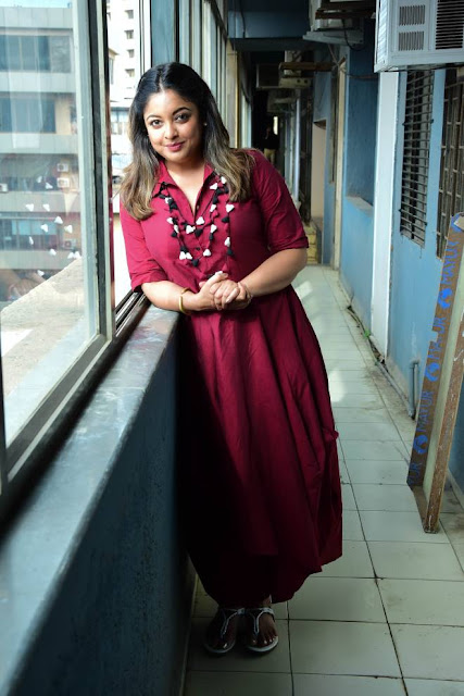 Tanushree Dutta exuding elegance in her latest stills, showcasing timeless Bollywood glamour.