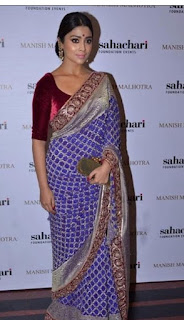 Maroon blouse with purple saree
