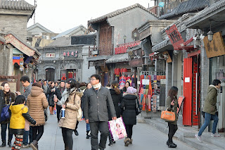 Pedestrians on Yandaixie Jie near Houhai in Beijing