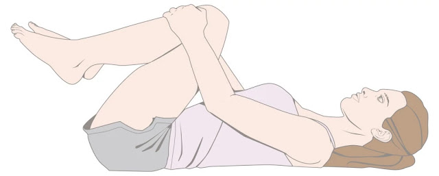 lower back pain - lie on the back - elevate knees