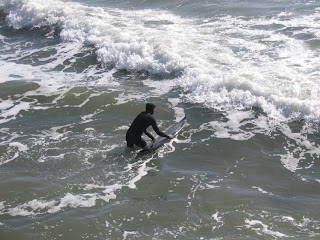 Launching off on the surfboard