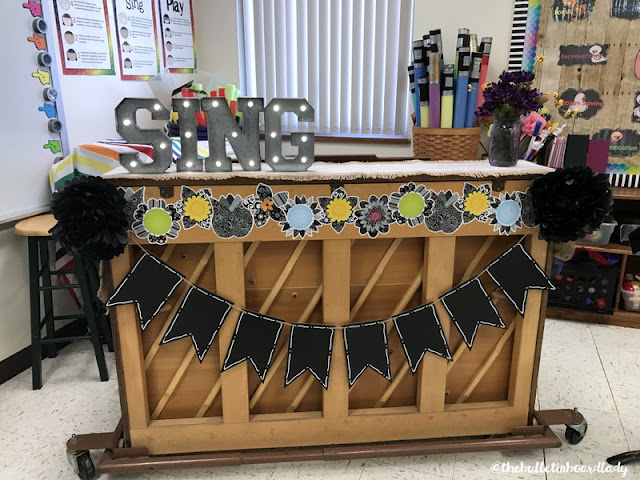 Be inspired by this farmhouse themed music room.  Rustic decor and bold accents help set this music classroom up for optimal learning.  Bulletin boards, flexible seating, organization ideas and more!