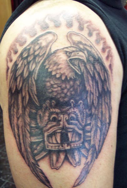 The most common location for an eagle tattoo includes the back, chest, 