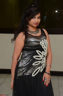 Shrisha Dasari in Sleeveless Short Black Dress At Follow Follow U Audio Launch 059.JPG