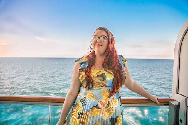 UK Travel Blogger Becky The Owlet on a balcony on board Princess Cruises Regal Princess