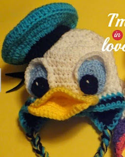 http://www.craftsy.com/pattern/crocheting/accessory/free-donald--daisy-inspiredhat-pattern/131577