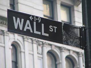 Wall Street Sign by Ramy Majouji via Wikimedia Commons - https://commons.wikimedia.org/wiki/File:Wall_Street_Sign.jpg