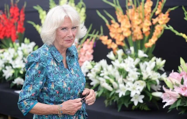 Camilla, Duchess of Cornwall wore a tropical print dress during the visit Queen Elizabeth's Sandringham estate in Norfolk