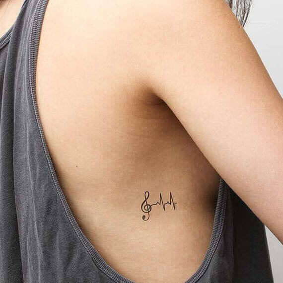 Mini tattoo feminina delicada: 84 ideias para inspirar sua próxima