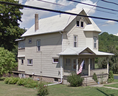 Sears Maytown: turret sided two-story farmhouse with front porch and bay window on the front and side