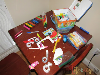 This art table is full of activities children can do on their own to keep up with basic skills such as cutting, coloring, and writing.