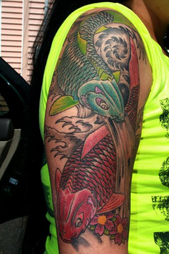 Koi Fish Sleeve Tattoos Designs. Koi is a word made popular by the Japanese 