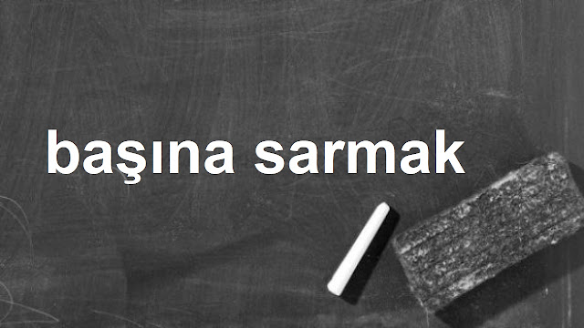 başına sarmak