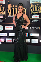 Varalaksmi in Green Glittering Sleeveless Backless Gown at IIFA Utsavam Awards 2017  Day 2  Exclusive 13.JPG