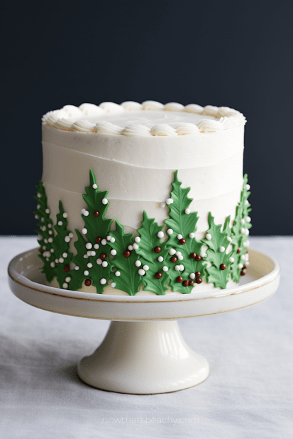 green leaves holly theme Best 50+ Christmas Cakes to Lust After for Your Festive Party Ideas, Buttercream Frosting Holiday Homemade Cake Inspo to DIY. Dessert Ideas for Events
