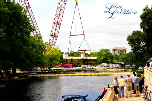 The 400-ton Submarine Theater is lifted out of Spring Lake at Aquarena Center, Texas State University-San Marcos. Photo by Lisa On Location photography.