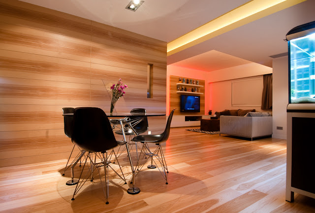 Picture of small round glass table in the dining room as part of the Hong Kong apartment design