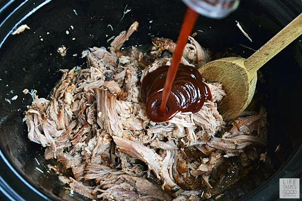 Add your favorite BBQ Sauce to the shredded pork meat