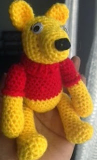 http://www.ravelry.com/patterns/library/cute-little-winnie-the-pooh