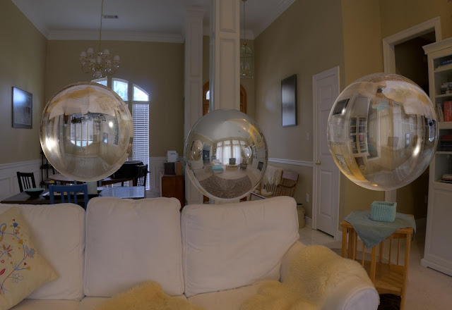 A raytraced environment mapping example with both glass and silver balls.