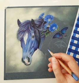 07-Blue-horse-and-butterfly-Satu-Manninen-www-designstack-co