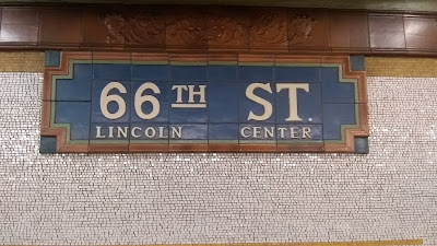 Tiling at 66th St. subway stop, NYC, stating 66th St., Lincoln Center