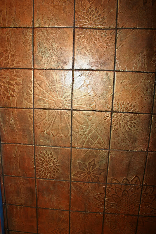 My Copper Tile Shower. Both projects over all white shiny tile, BTW. title=