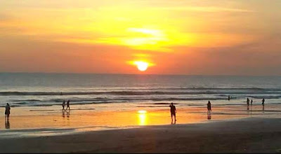 sunset pantai kuta bali